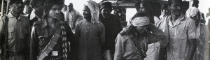 Phoolan Devi stands amongst several armed men