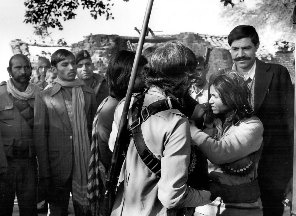 Phoolan Devi Gang Before Surrender - 1983 Phoolan Devi and members of her gang among a crowd just before their surrender, 1983